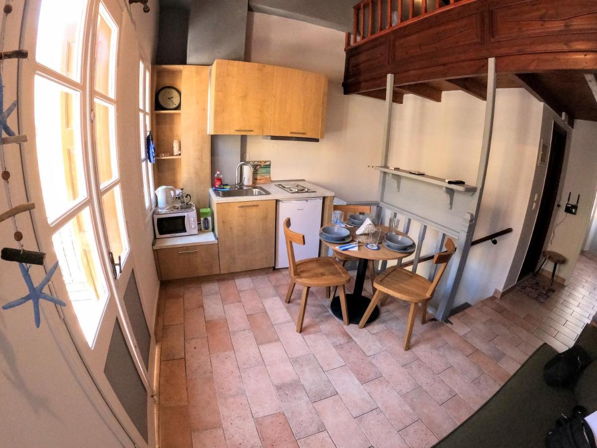 Cozy Apartments In Symi Center Bagian luar foto
